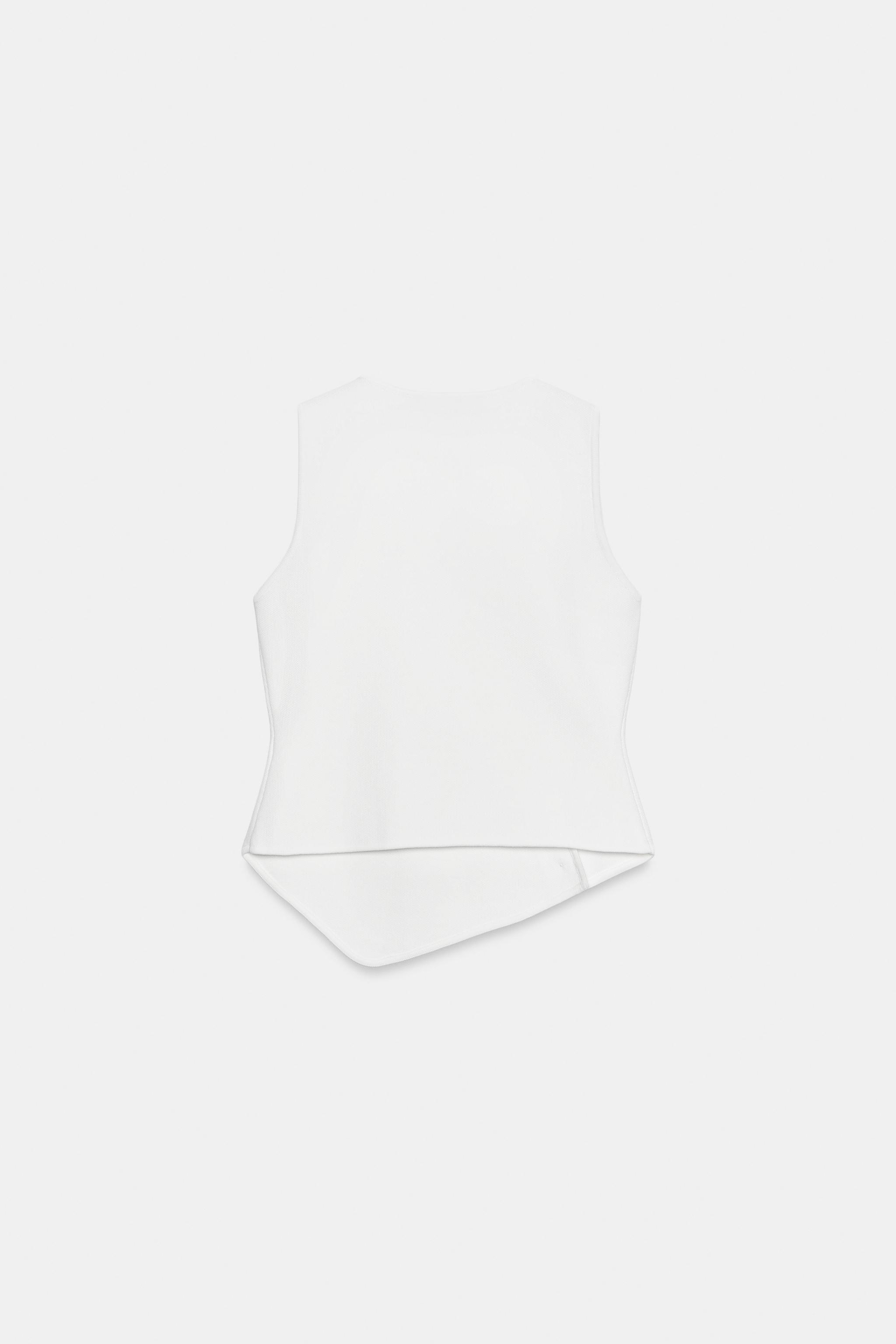 TOP EN MAILLE FERMETURE ASYMÉTRIQUE